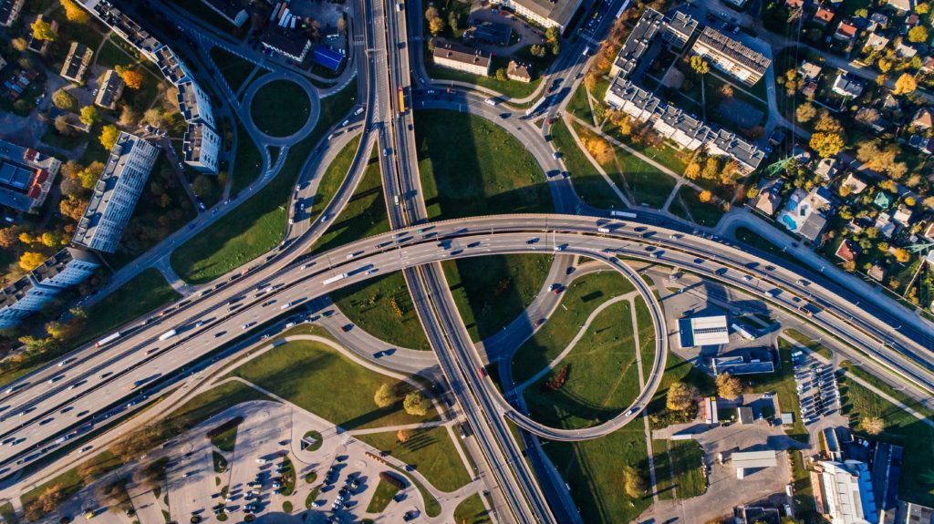aerial view of a highway interchange in a city
